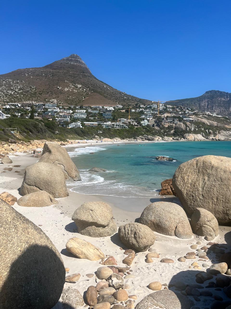 a man holding a cigarette in his right hand