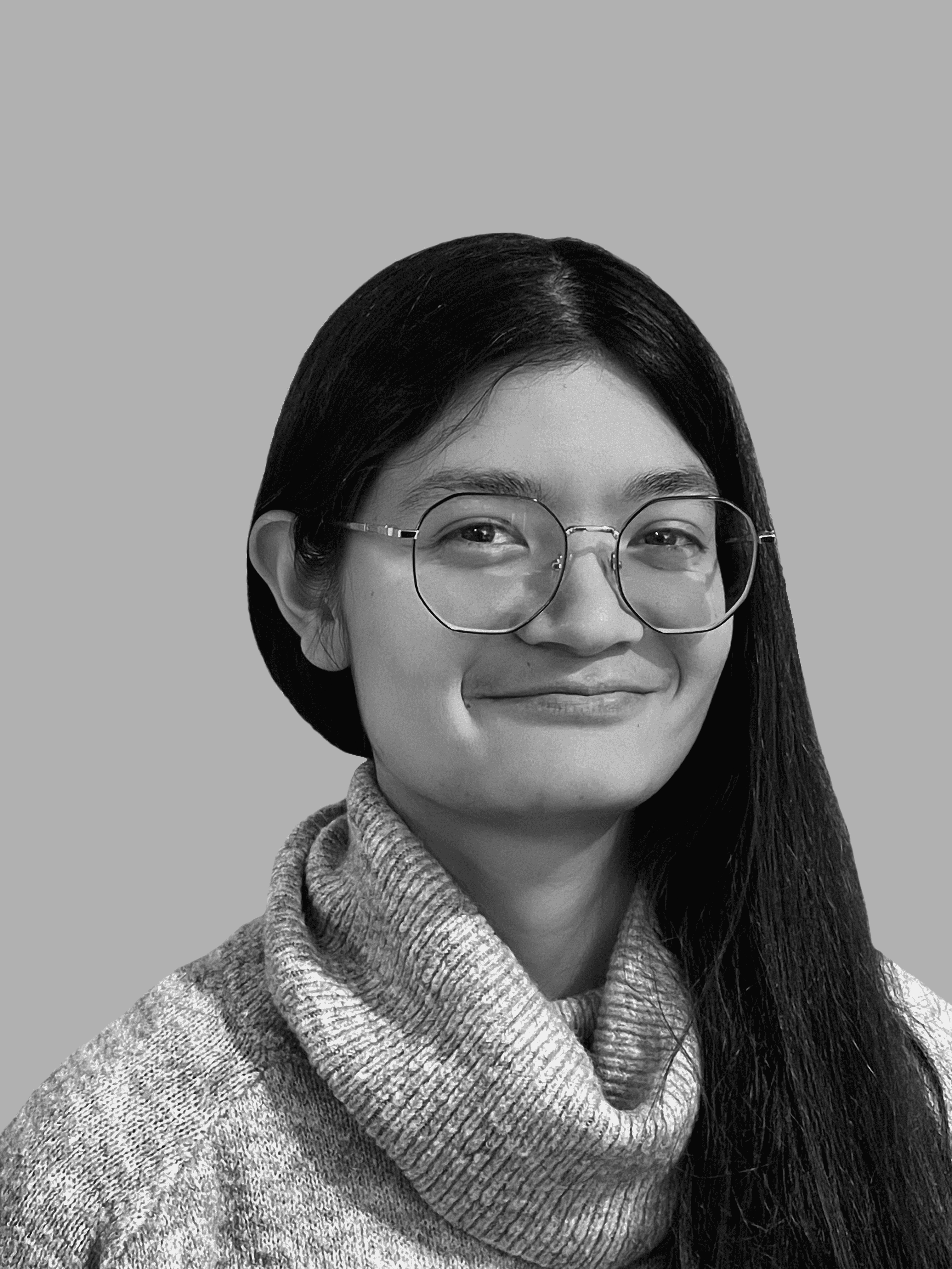 a blurry photo of a person standing in front of a wall