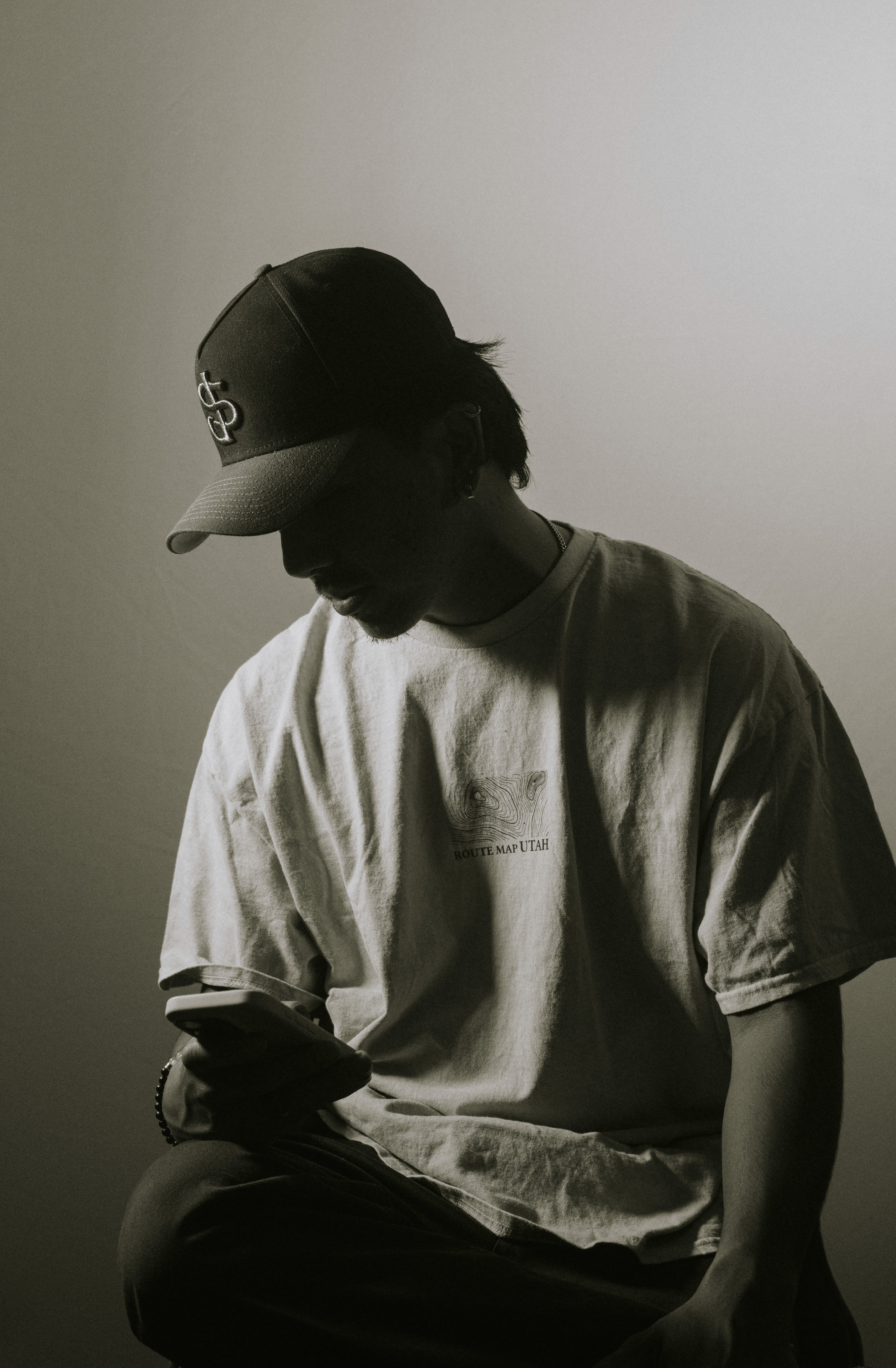 a blurry photo of a person standing in front of a wall