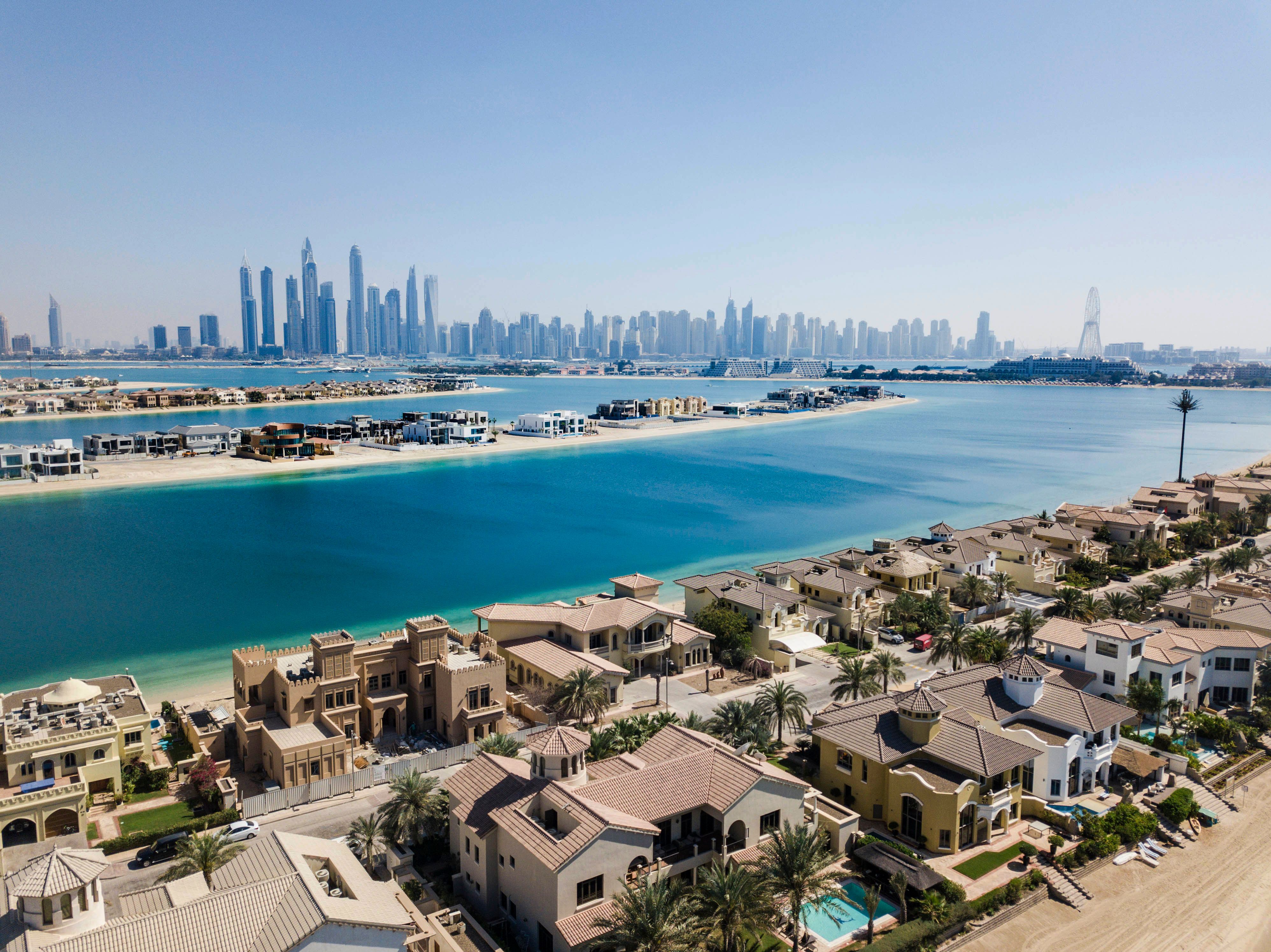Aerial view of Dubai waterfront properties and skyline representing a diversified fractional real estate portfolio through PRYPCO Blocks.
