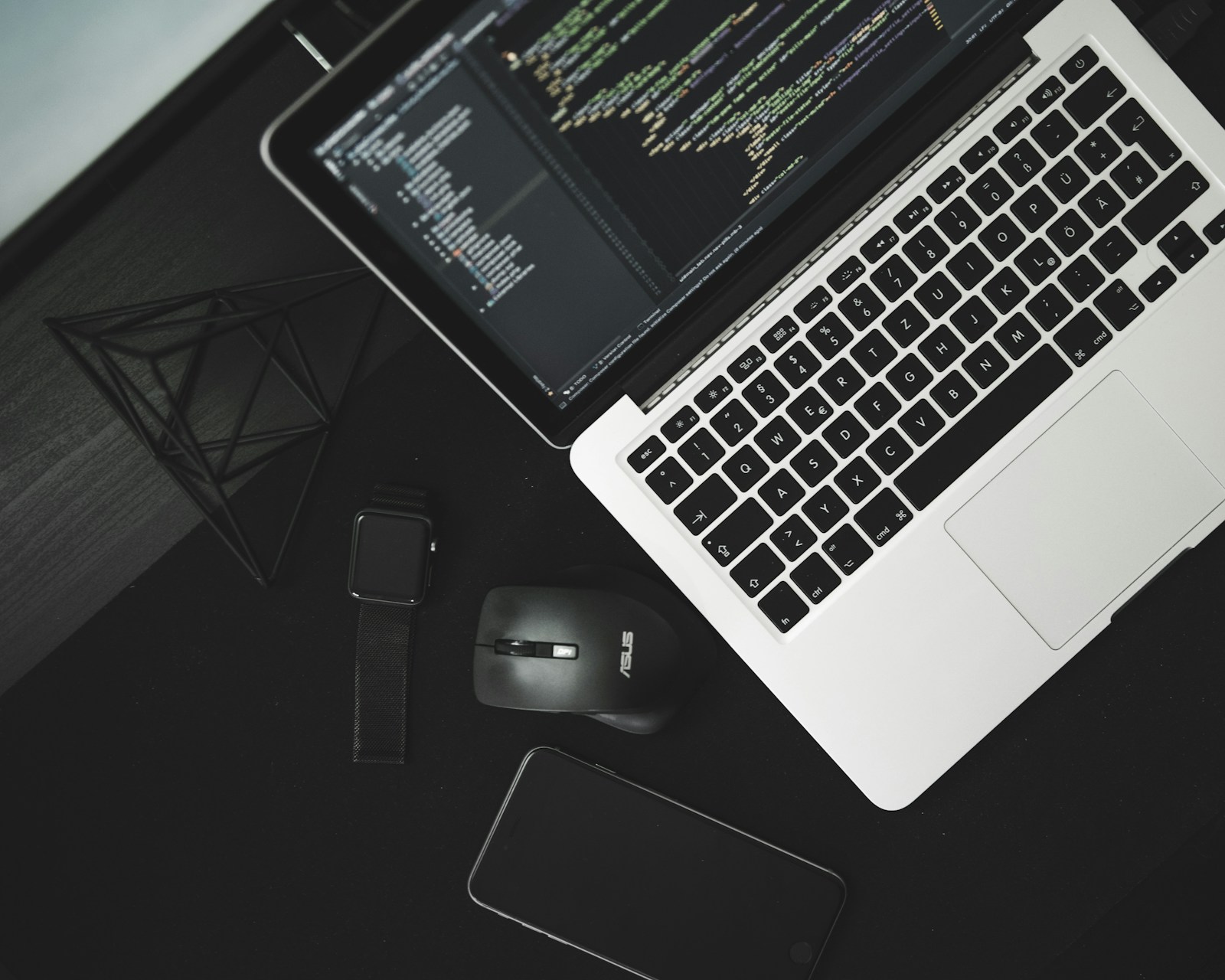 Developer laptop showing code, representing the build, test, and fix workflow with terminal agents