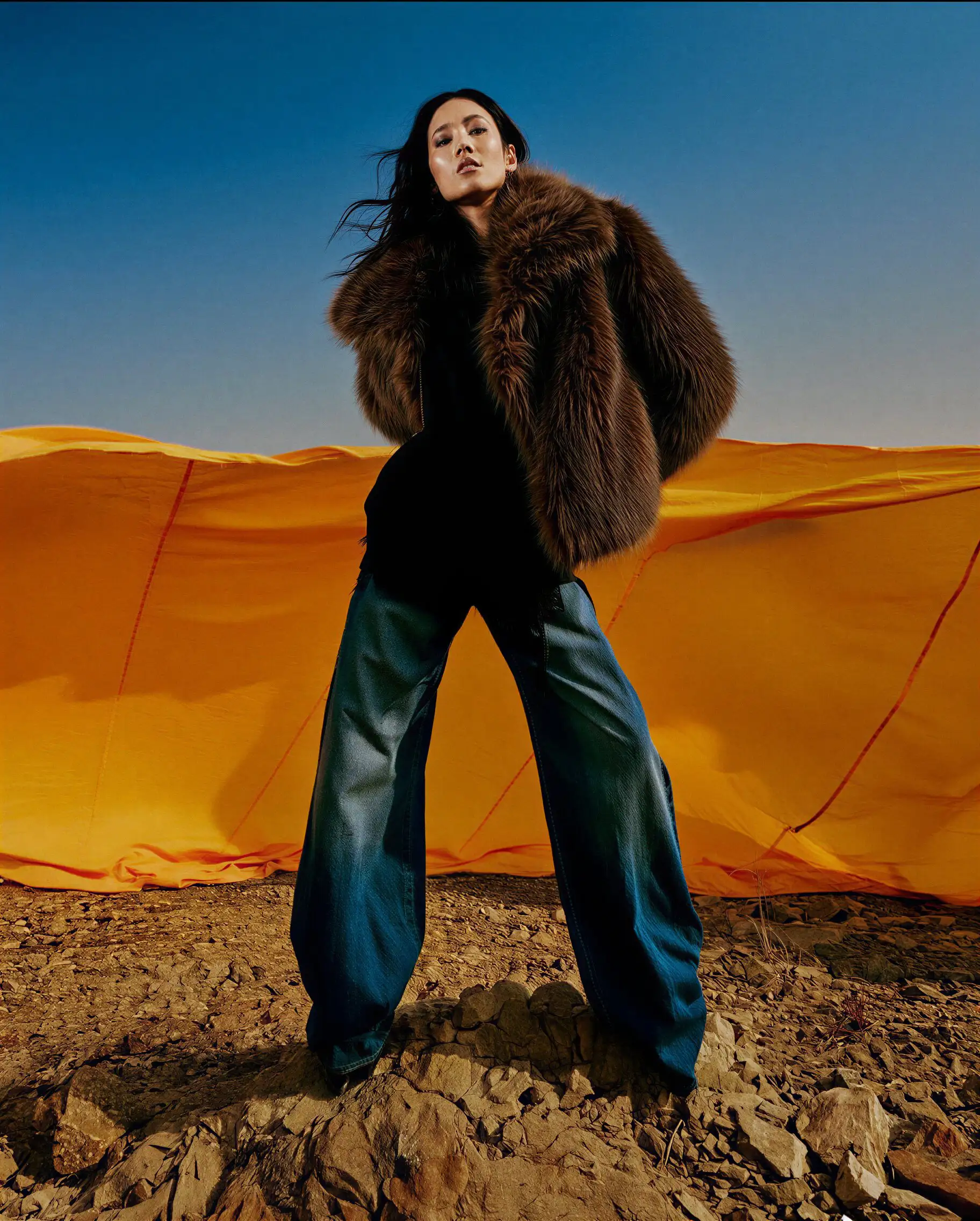 Souvenirs megastore illuminated at night with shoppers