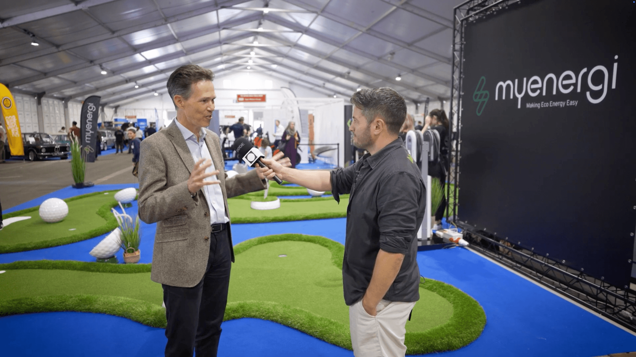 David Lewis being interviewed at the British Motor Show