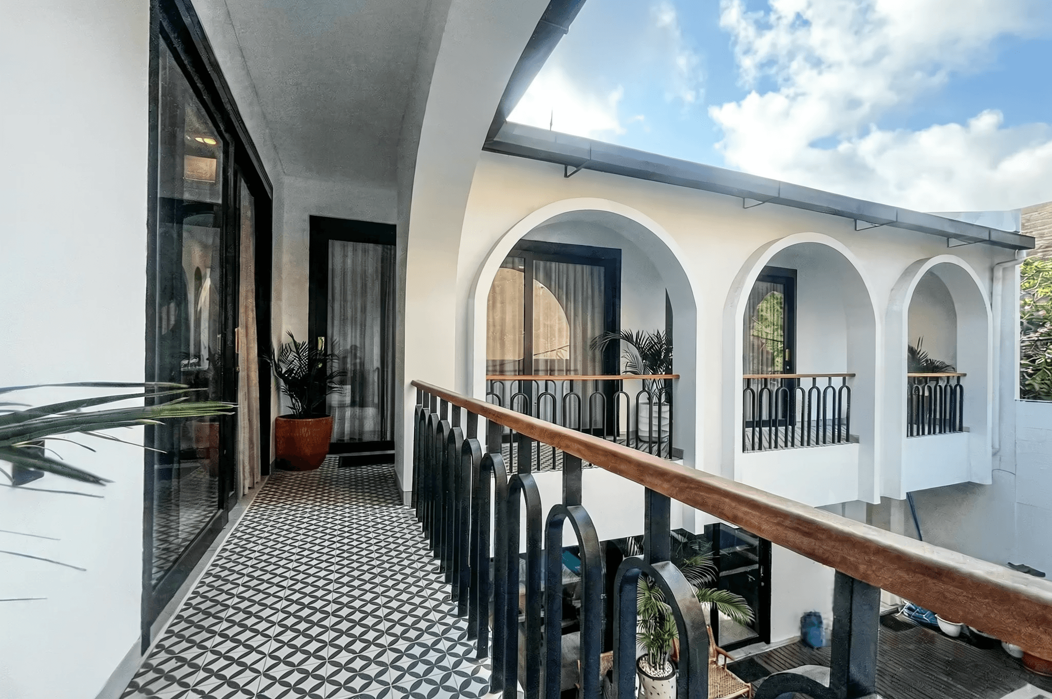 Twin bedroom in Jimbaran villa with boho-chic decor. Contact our real estate agent for family home viewings.