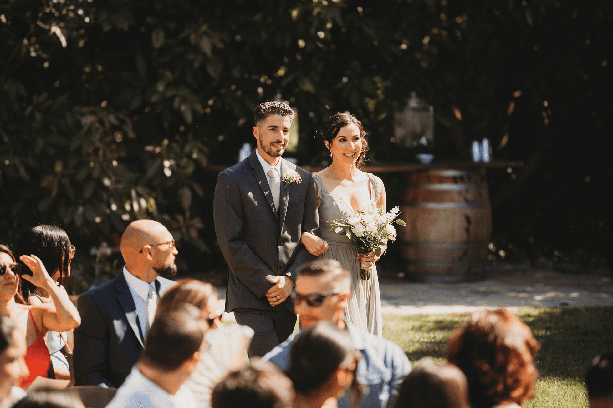 Flat lay wedding details with bouquet, rings, and sparkling bridal heels
