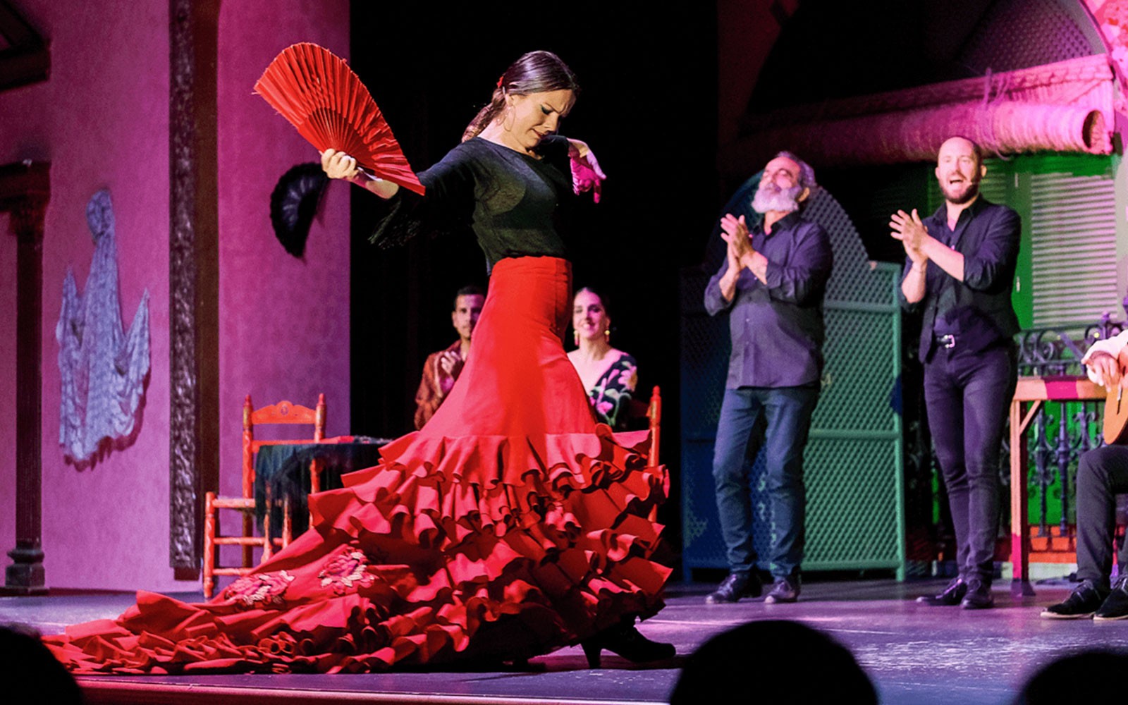 Flamenco dancer performing at Only Flamenco in Seville, showcasing traditional Spanish dance.