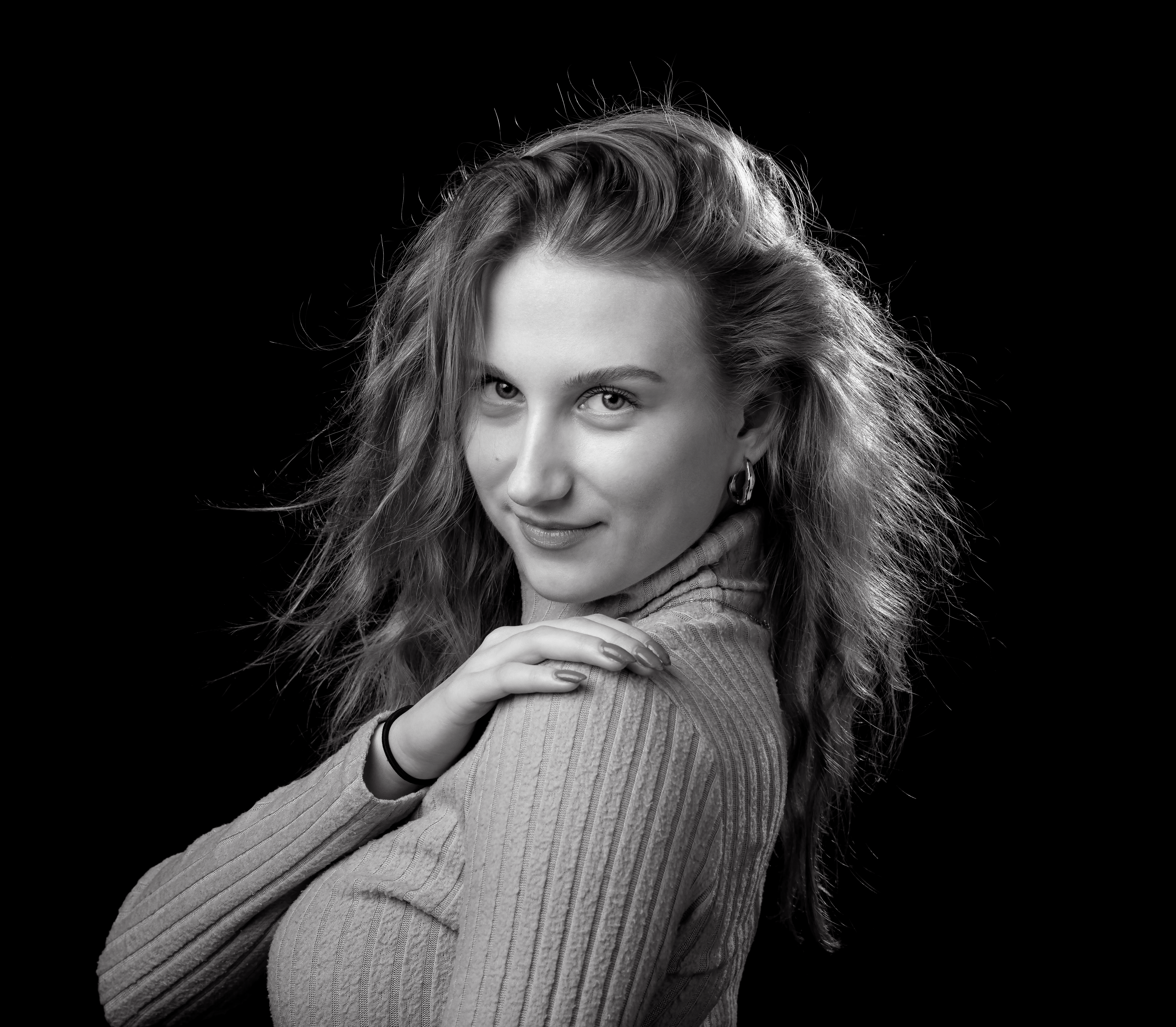 woman in black top posing