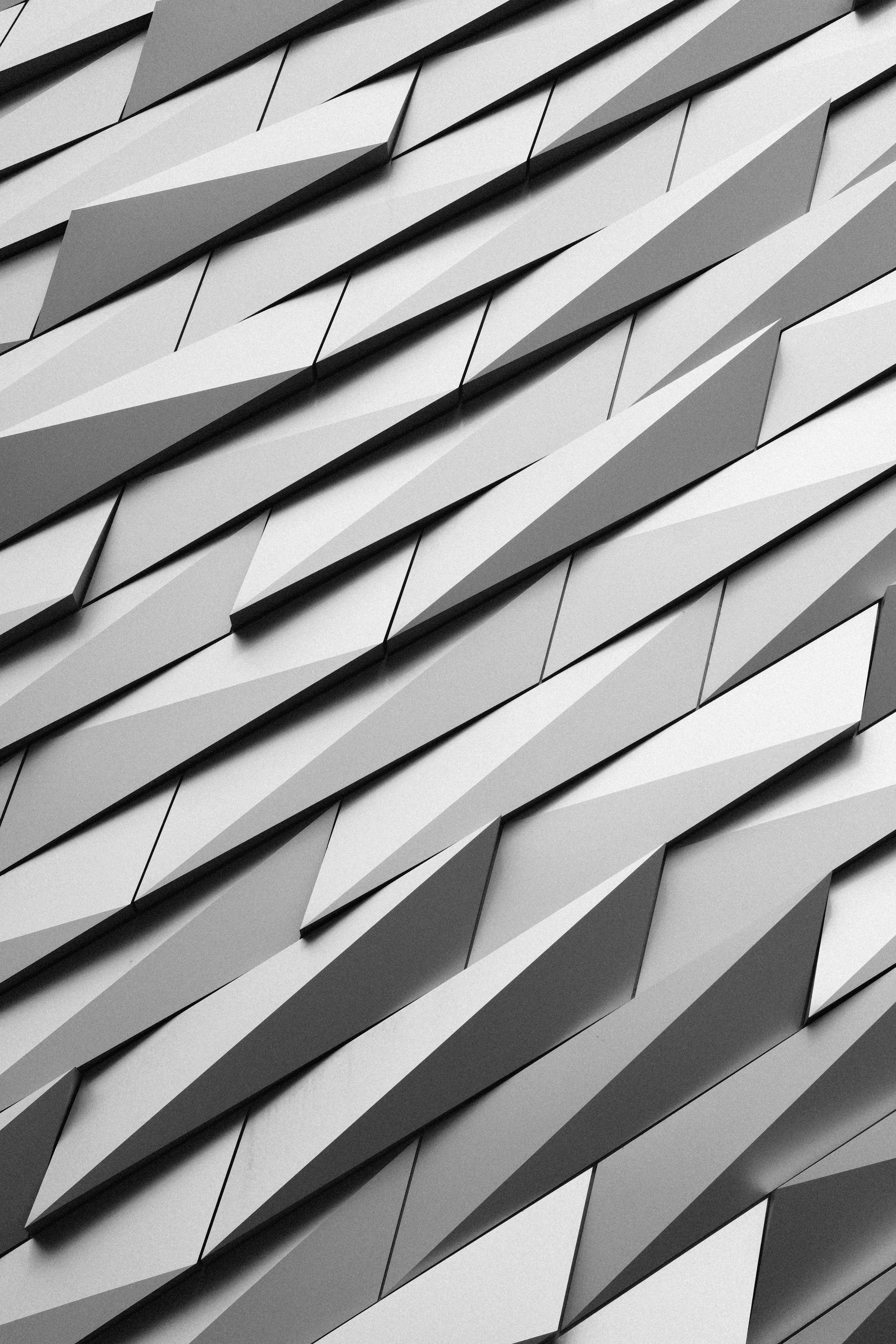 Abstract geometric pattern of angled metallic panels