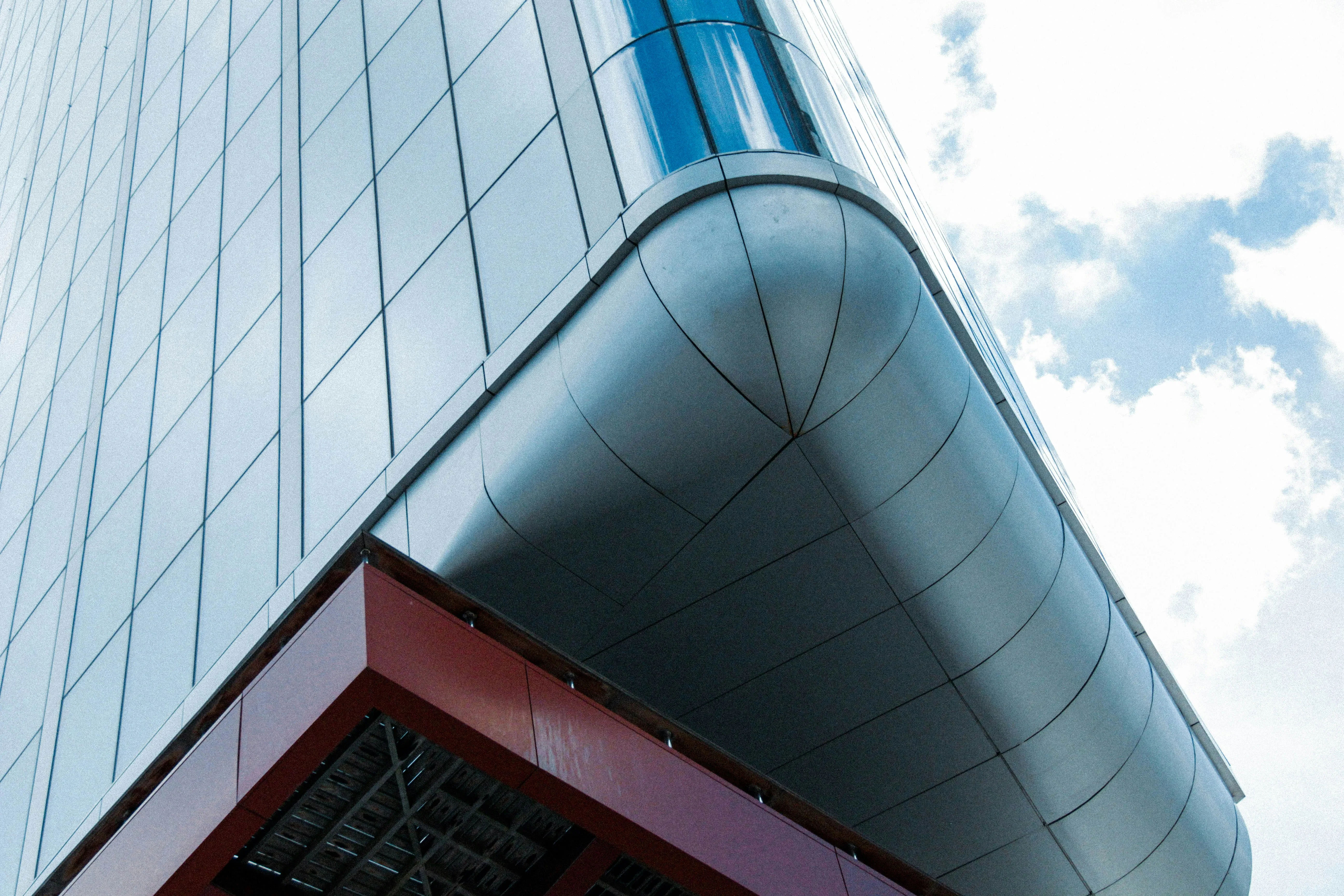 a large building with a curved roof