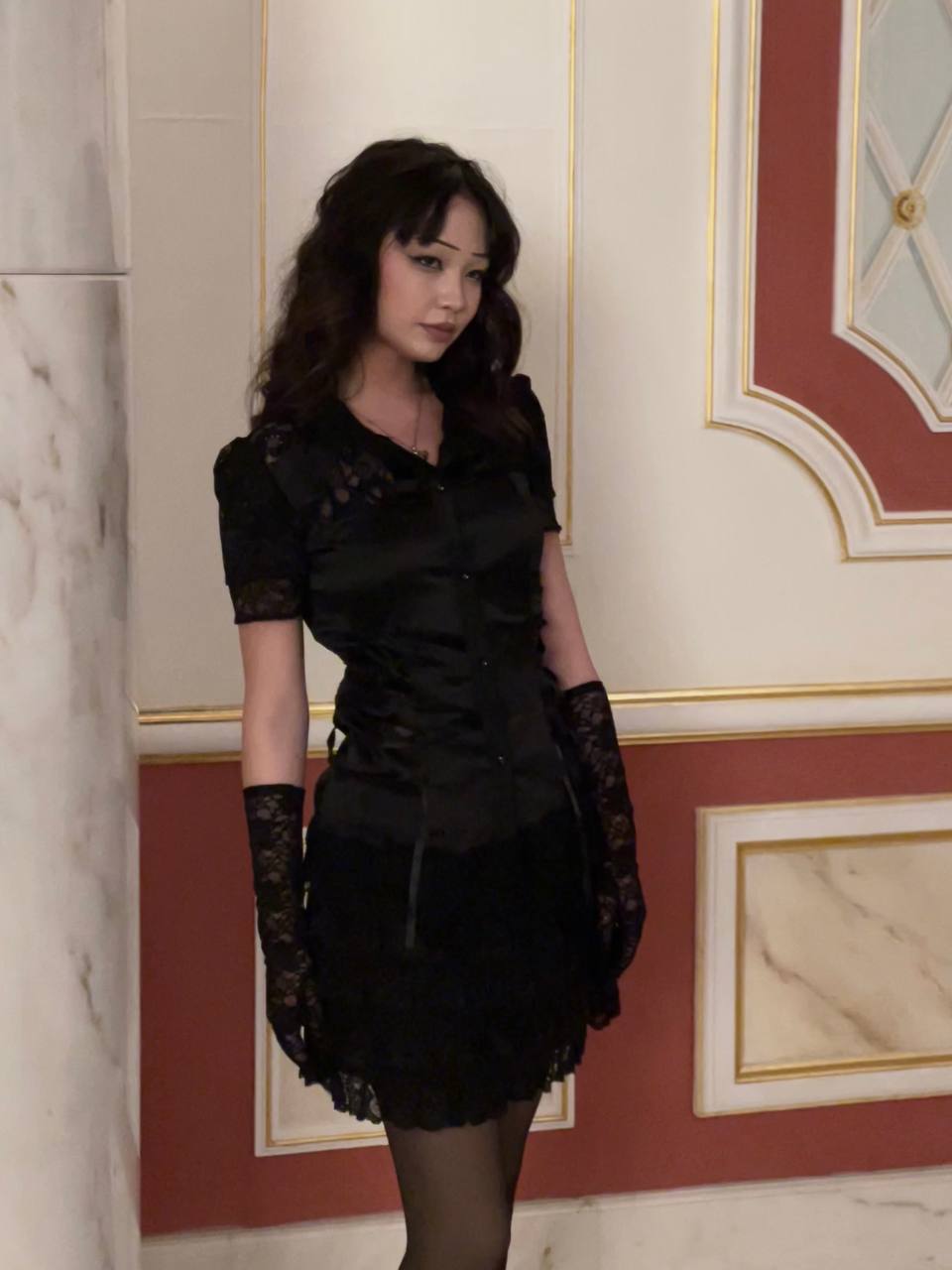 a man with a goatee smiles at the camera