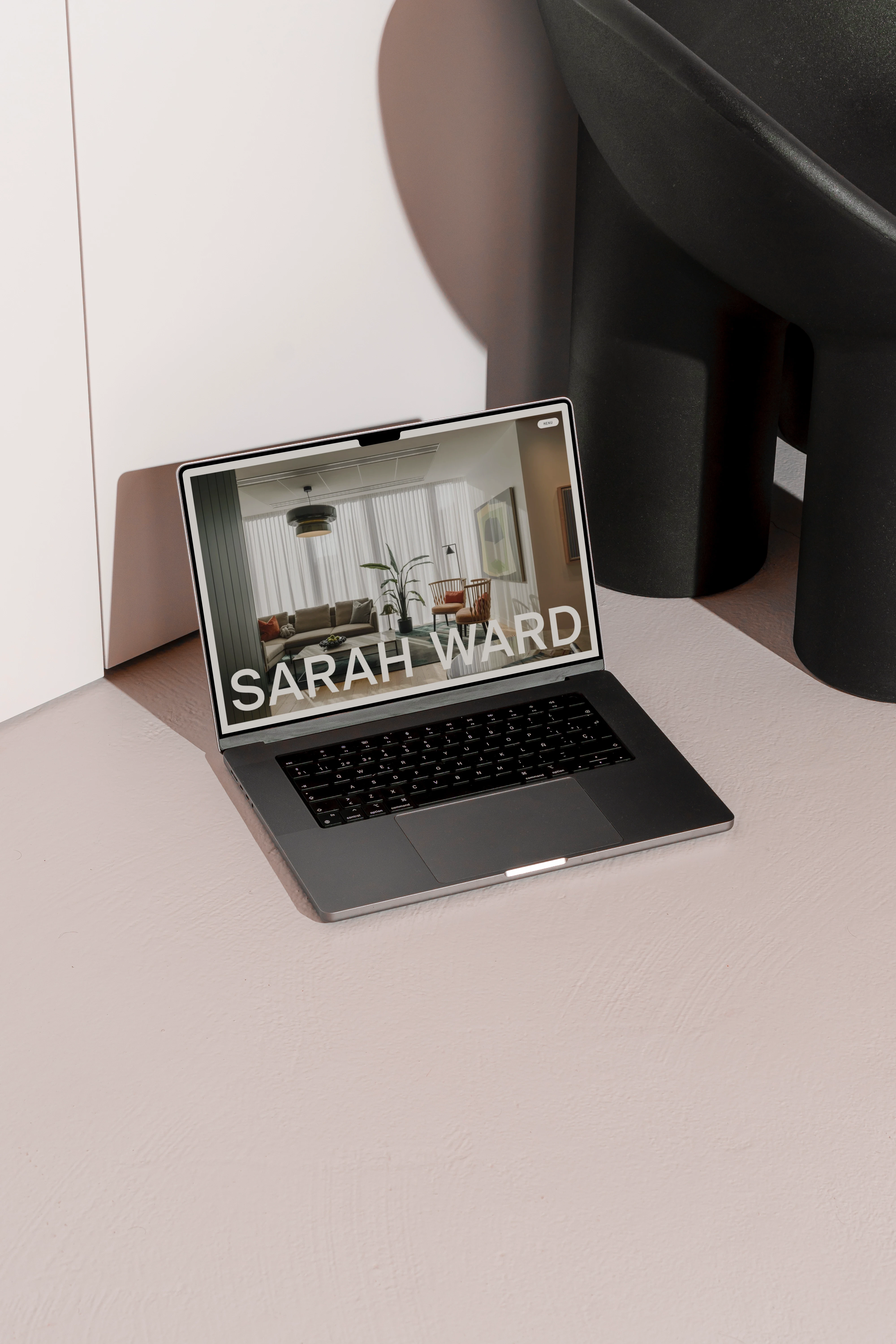 Sarah Ward Interiors website layout featuring editorial typography and imagery.
