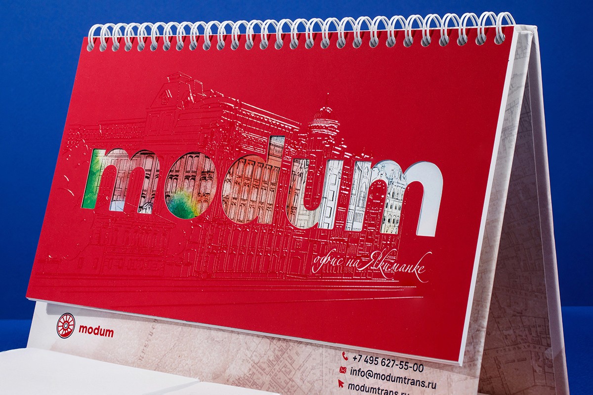 Calendars for Modum-Trans LLC printed on coated paper, coated board, binding board with die-cutting / plotter cutting, mounting to board, raised uv varnish, digital printing, silky soft-touch lamination.