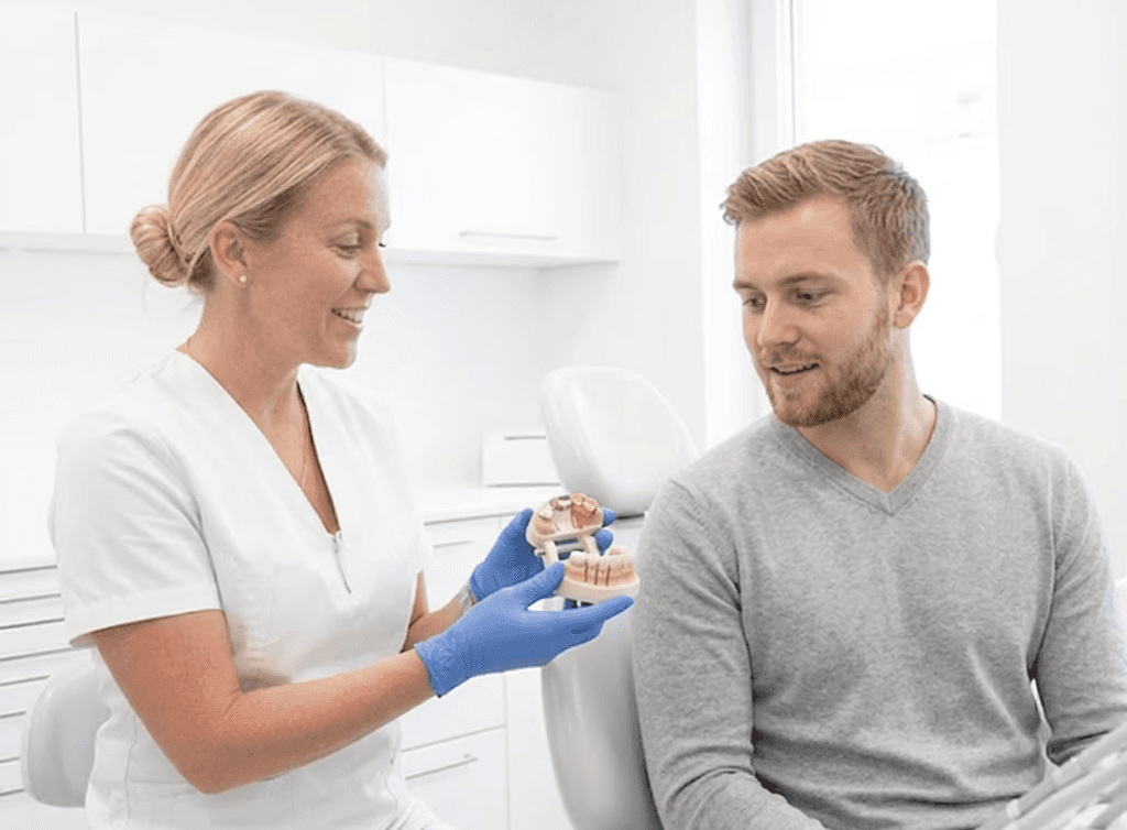Soon-to-be groom having a dental consultation to choose the right treatment for a wedding smile