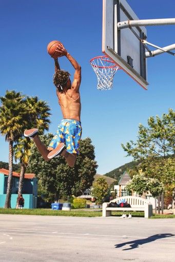 man playing basketball