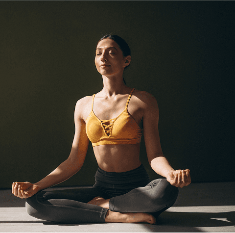 A women doing morning yoga