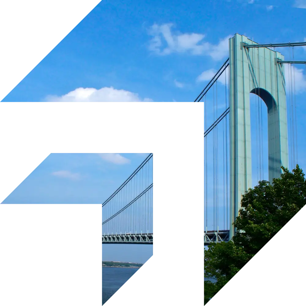 A bridge under a clear blue sky symbolizing strong connections and smooth processes — representing GIA Group, LLC’s commitment to helping truckers streamline and speed up their insurance claims.