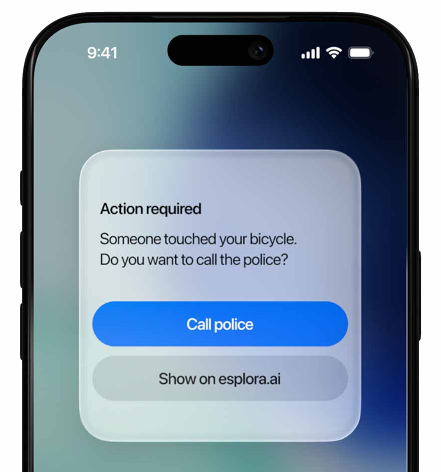 A smartphone screen displays a notification alert stating, "Action required: Someone touched your bicycle. Do you want to call the police?" with options to "Call police" or "Show on esplora.ai".