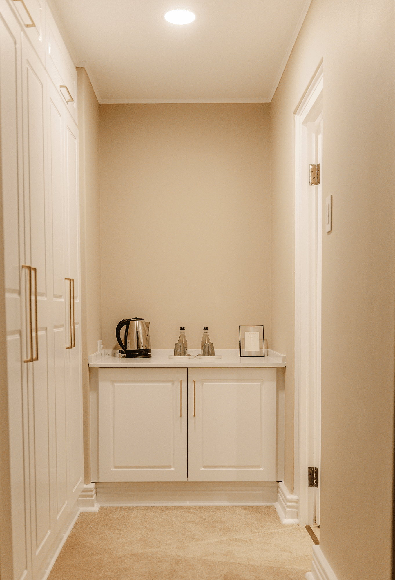 Redlands Hotel Executive Suite bathroom featuring modern bath and shower
