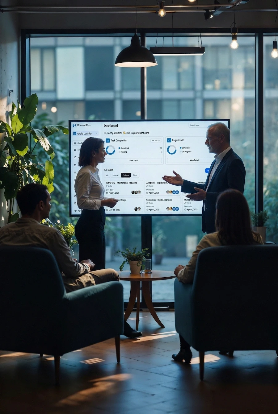 A manager using a digital dashboard to monitor maintenance efficiency and cost savings.