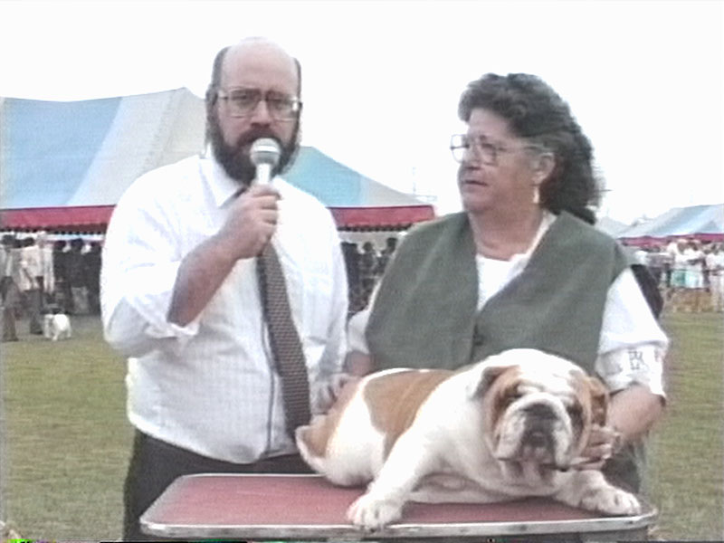 Sincerely, Ric still - Ric Interviewing dog handler