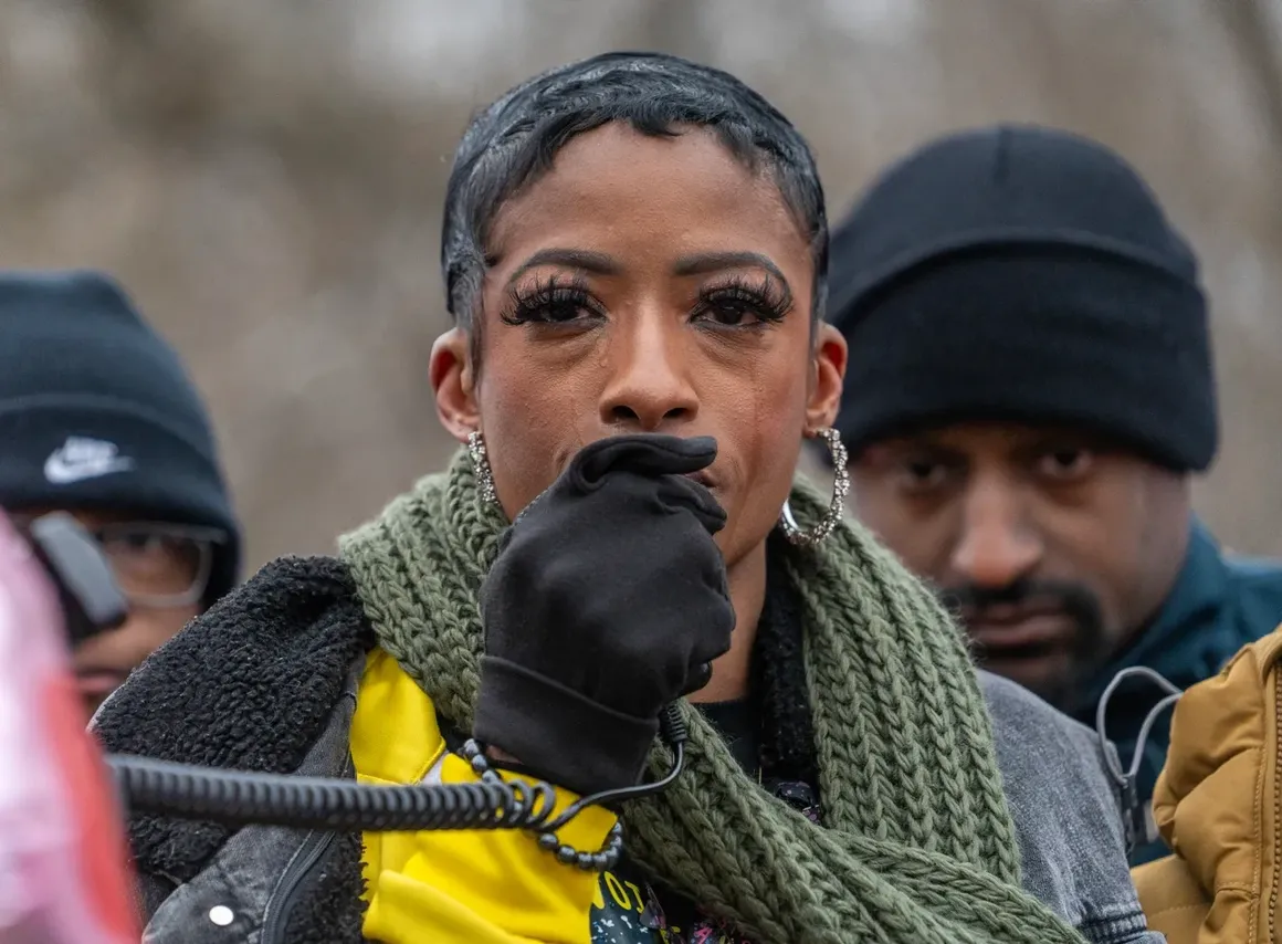 a black and white living room with a large tv
