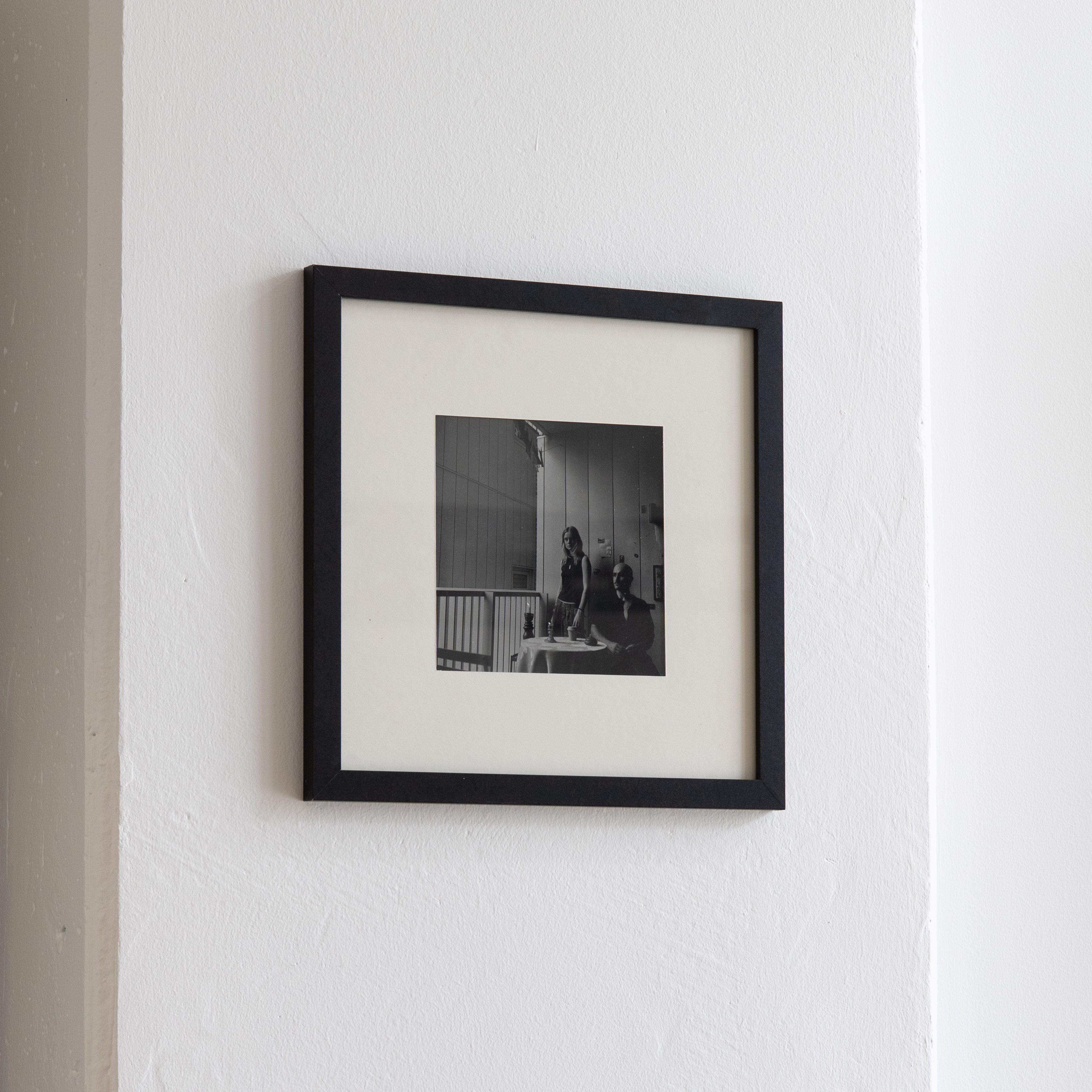 Darkroom prints drying on wire racks