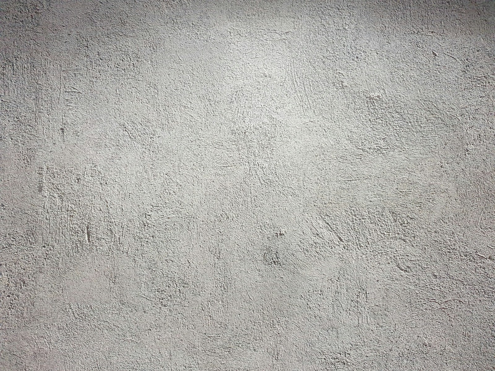Lime plaster being worked while still wet