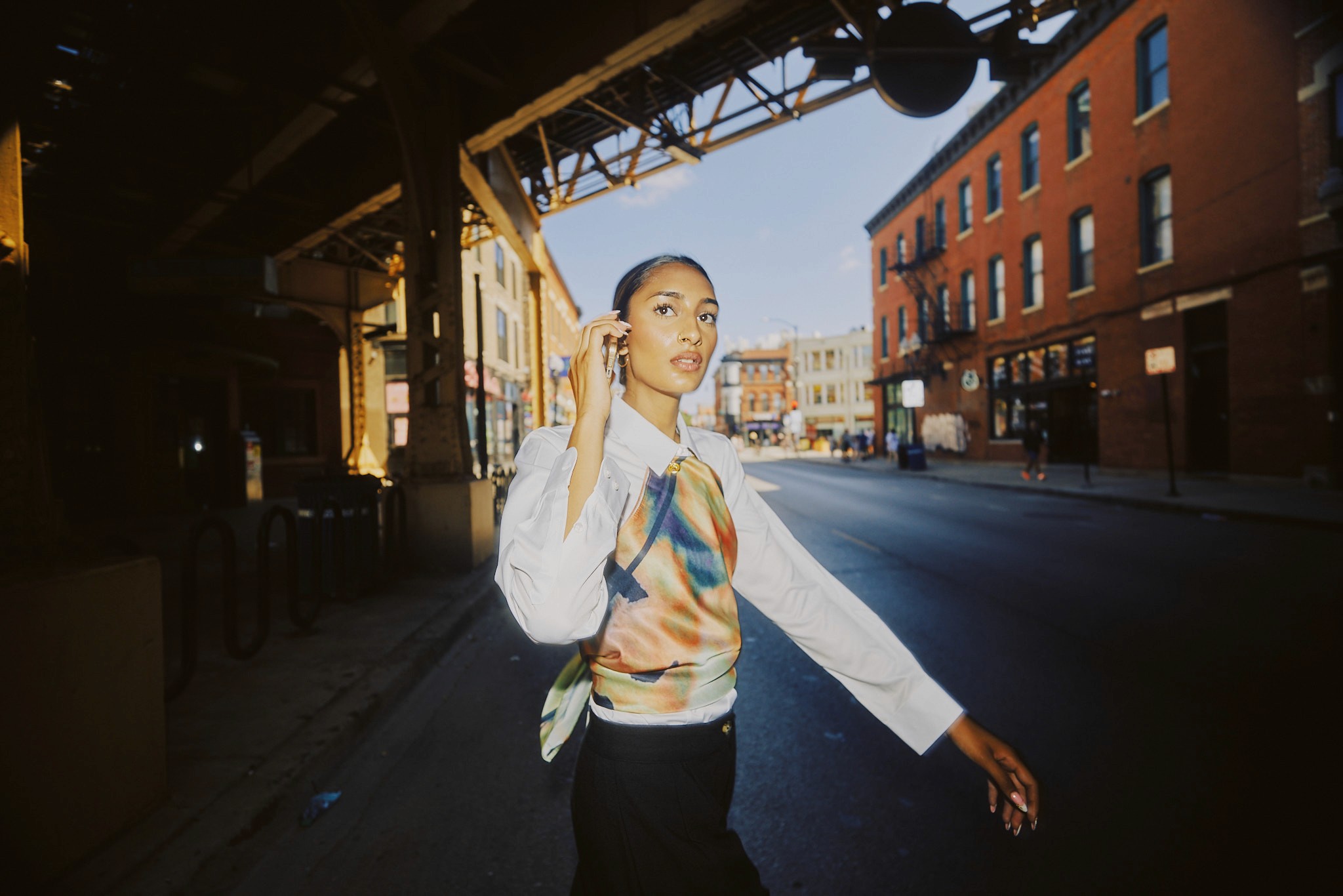 American flag flying against a cloudy sky