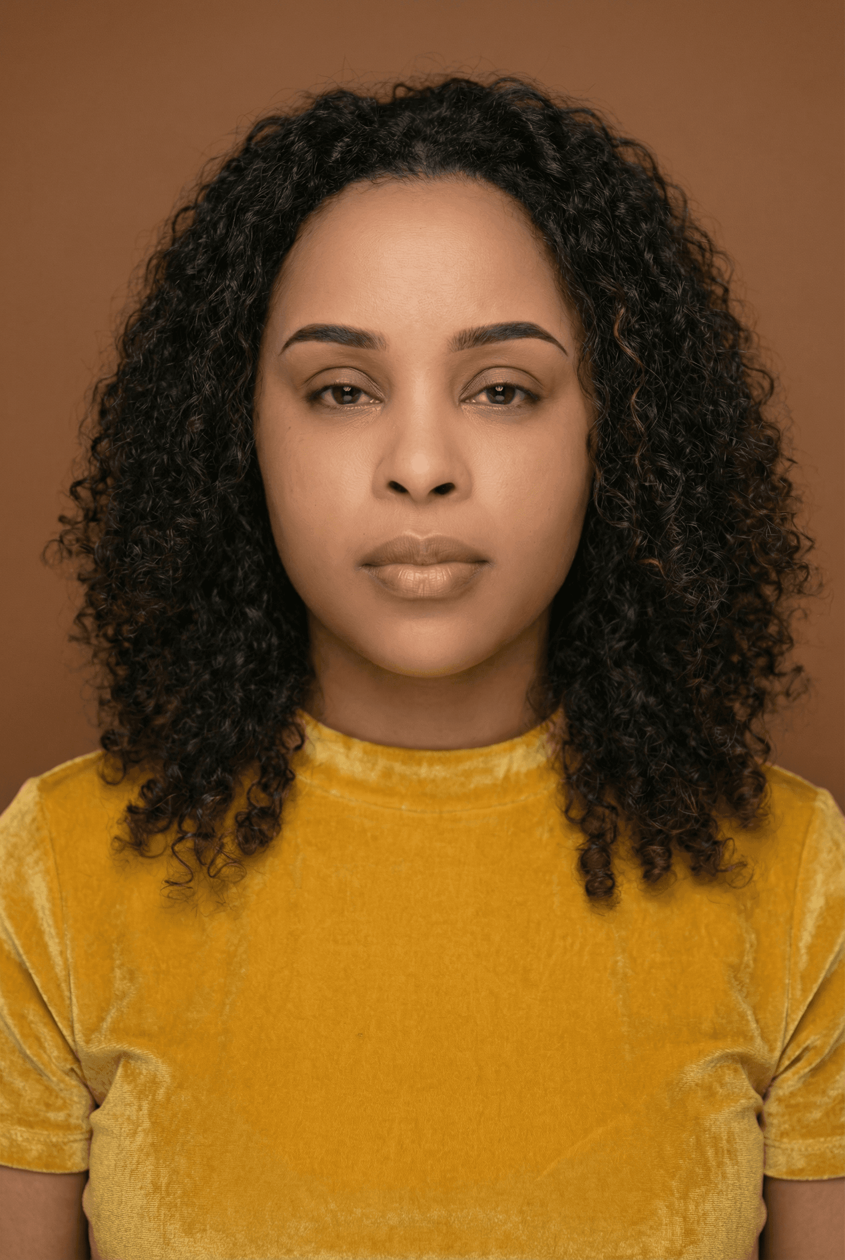 Woman applying skincare on her face