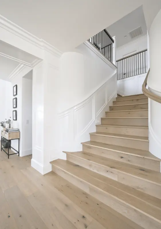 Portrait shot of the stairway taken from the right, showcasing the design and architecture in the Dana Point Remodel. Photo by Todd Huge.