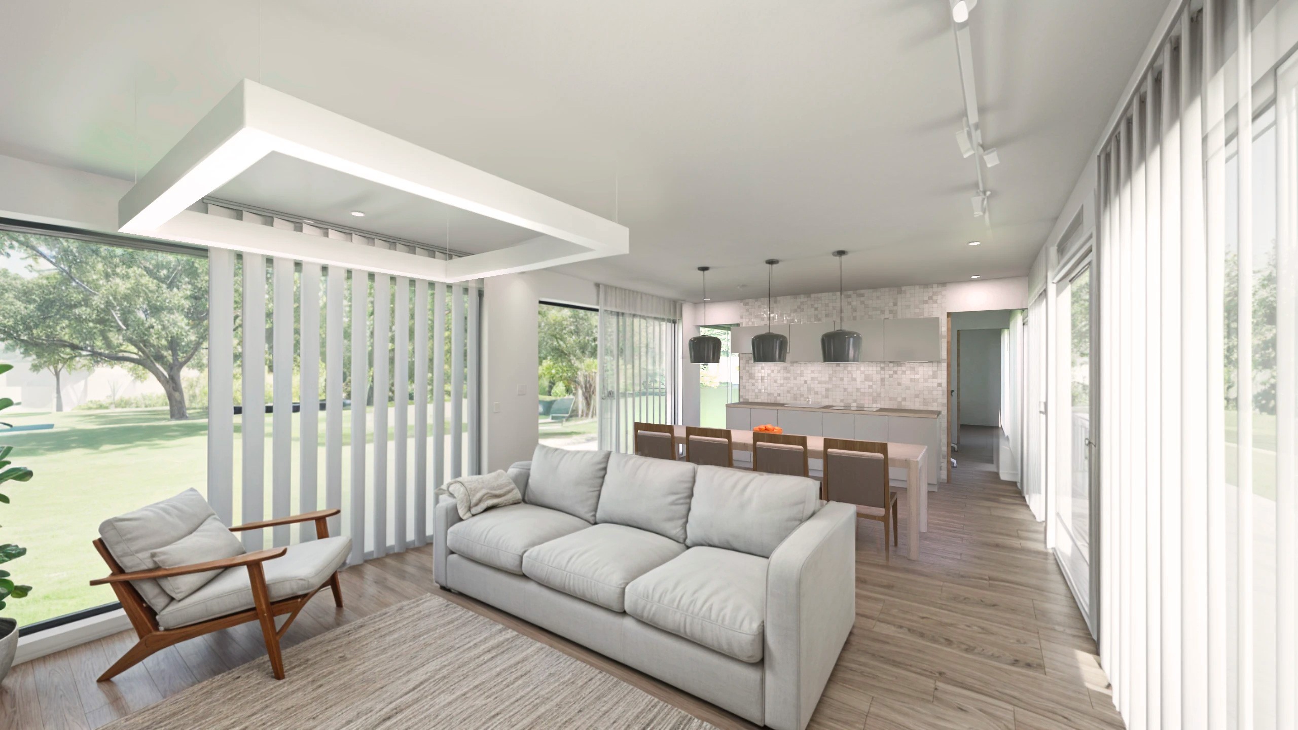 Interior view of a one-bedroom apartment showing a bright living room, kitchen, and dining area with modern furniture for small spaces.