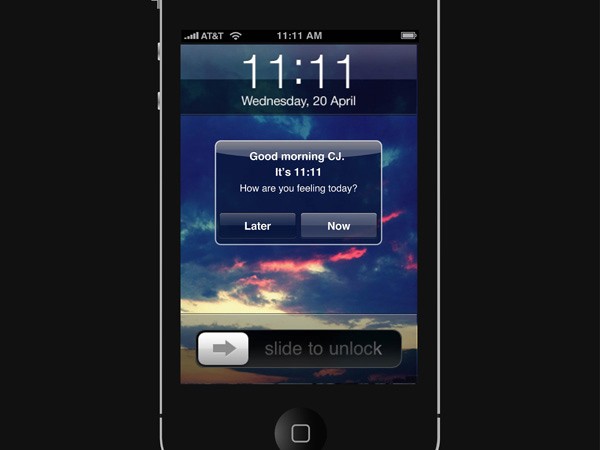 The image shows a smartphone screen displaying the date Wednesday, 20 April, and the time 11:11 AM. The screen also displays a weather widget indicating “Good morning CJ. It’s 11:11.” Below the weather information are two buttons labeled “Later” and “Now.” The bottom of the screen shows a button labeled “slide to unlock.” The phone’s status bar indicates AT&T network connectivity.