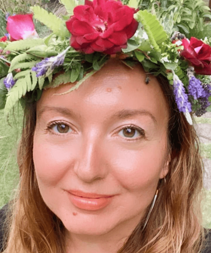 Woman wearing flower crowns.