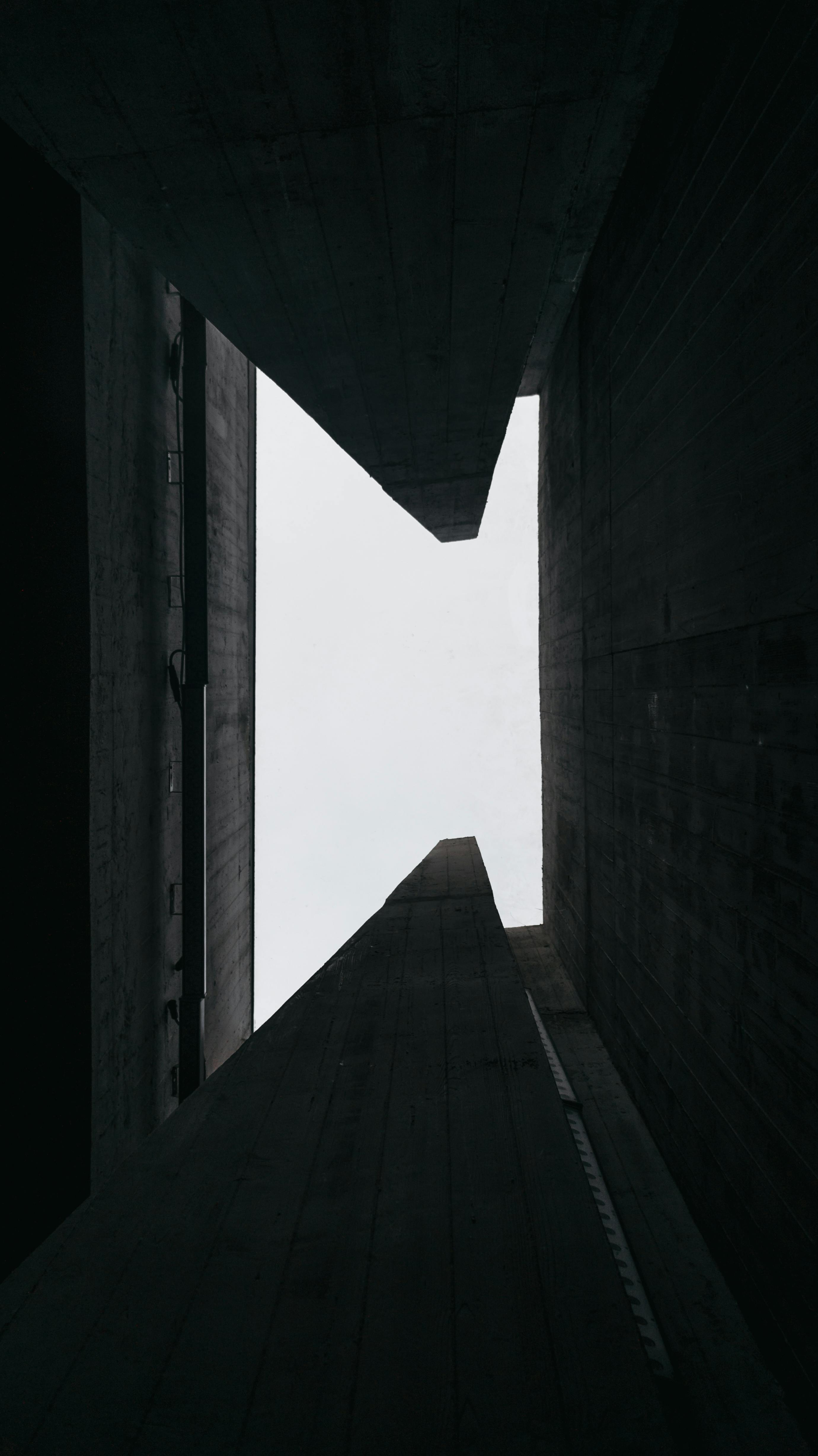 A dark ambience sky view in between builings.