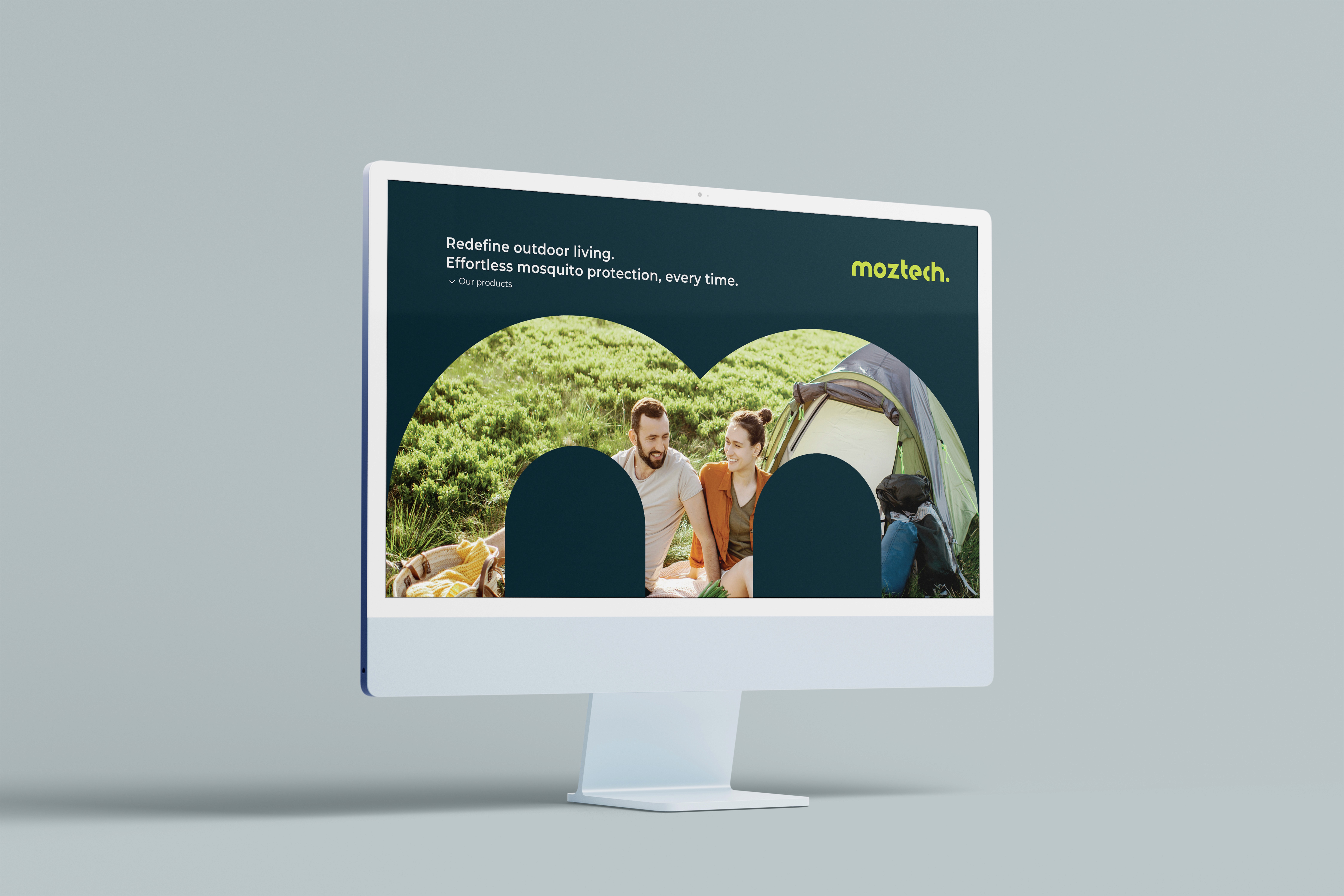 Black and white image of people working at a table with laptops, showing hands gesturing during discussion of digital content displayed on screens, with fabrica® logo in the corner.