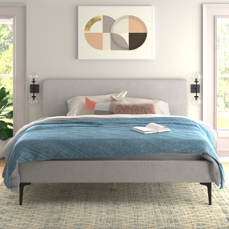 Optimize your space with the garfinkel upholstered platform bed, perfect for work or relaxation.