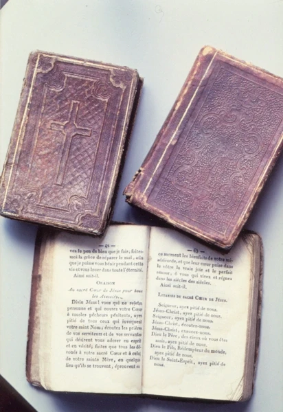 Old books on an open ledger
