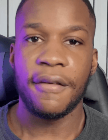 A person wearing the white shirt looking at the left