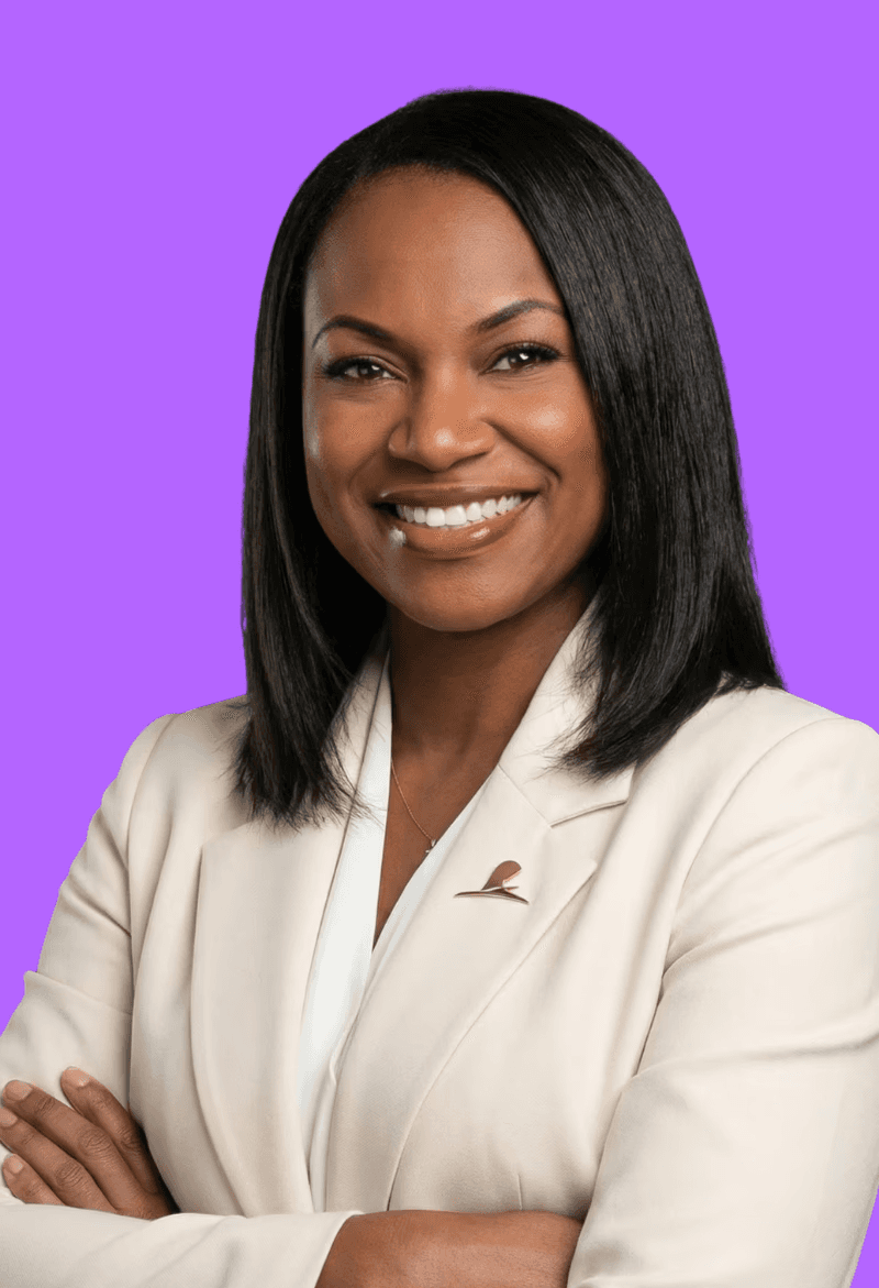 Portrait of a person in dark clothing speaking on a phone