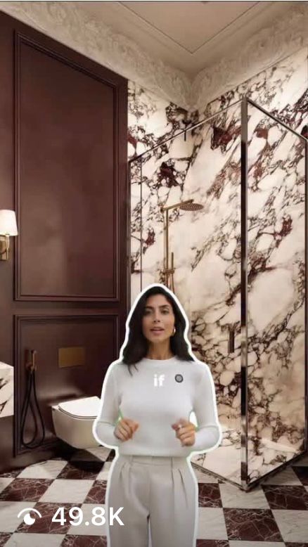 black DSLR camera floating over man's hand at the woods