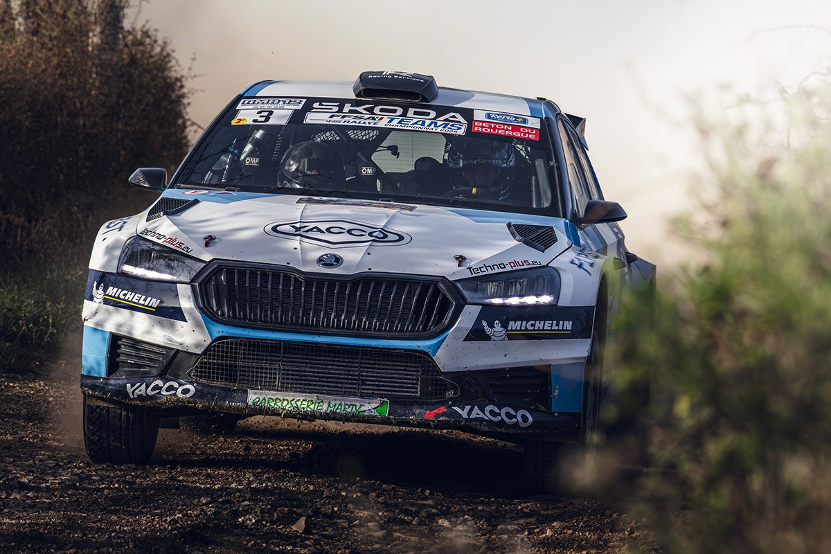 Black and white photo of man posing on camera