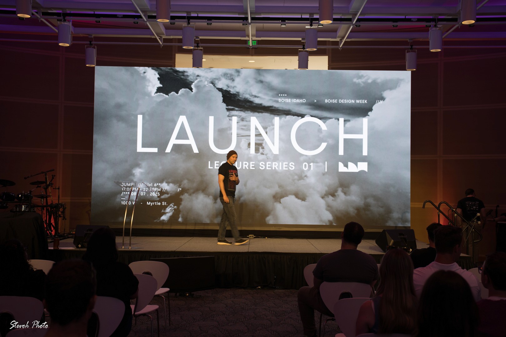 Man wearing a bandana and graphic t-shirt