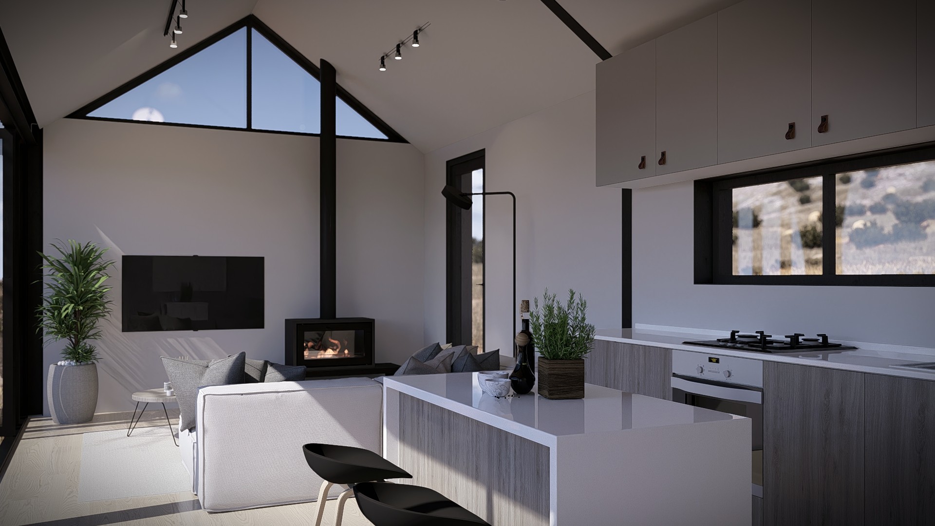 Open-plan kitchen and living area with skylights and a fireplace