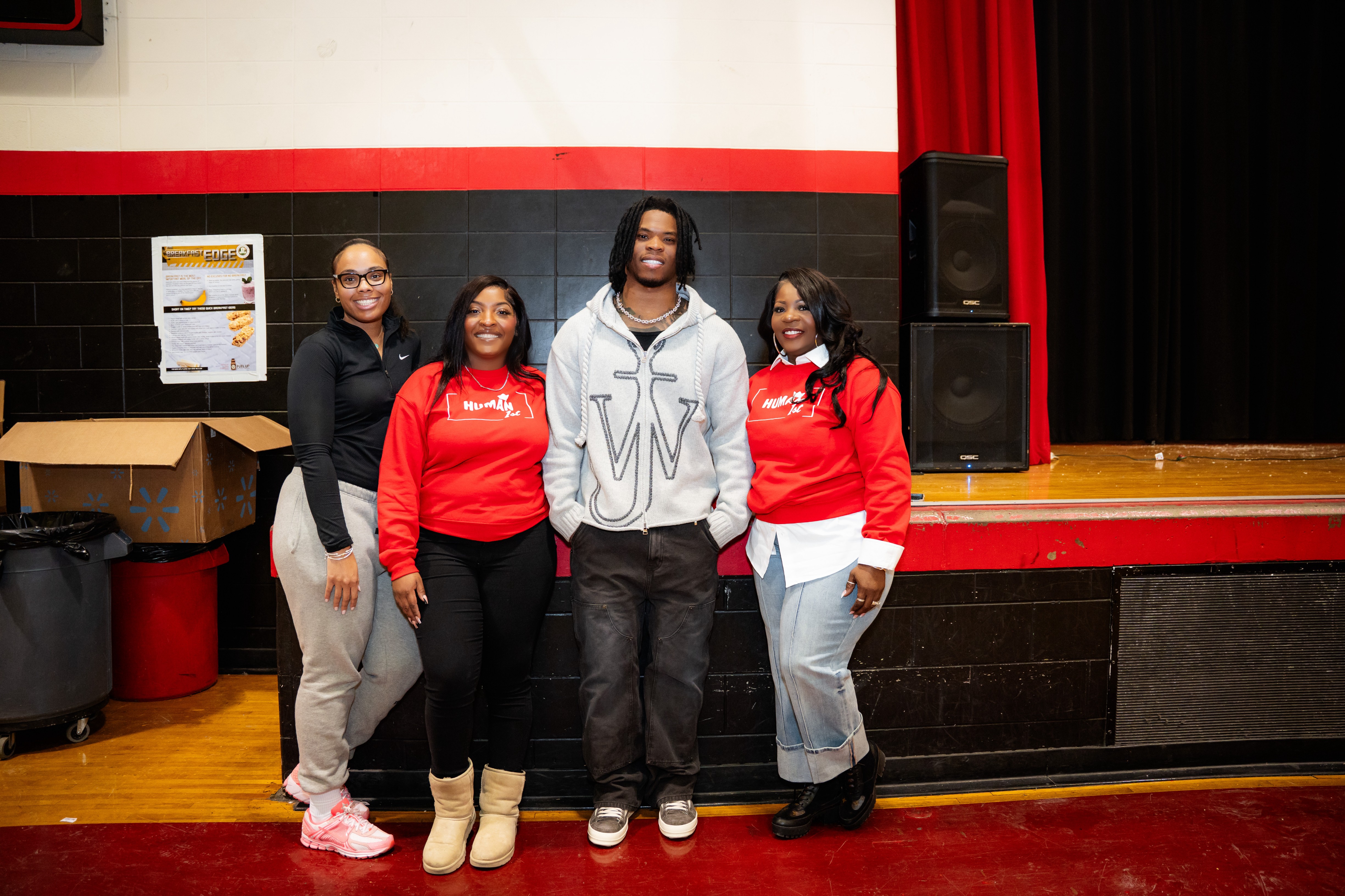 a black and white living room with a large tv