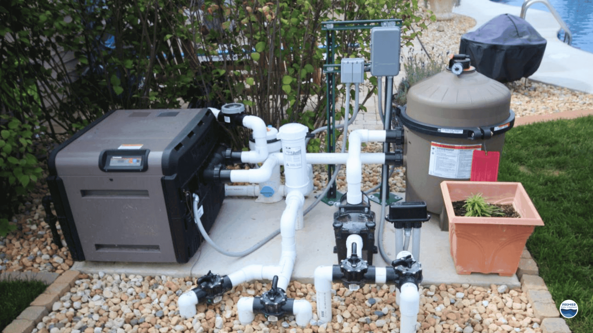 Pool equipment setup including pump filter and heater affecting vinyl pool cost