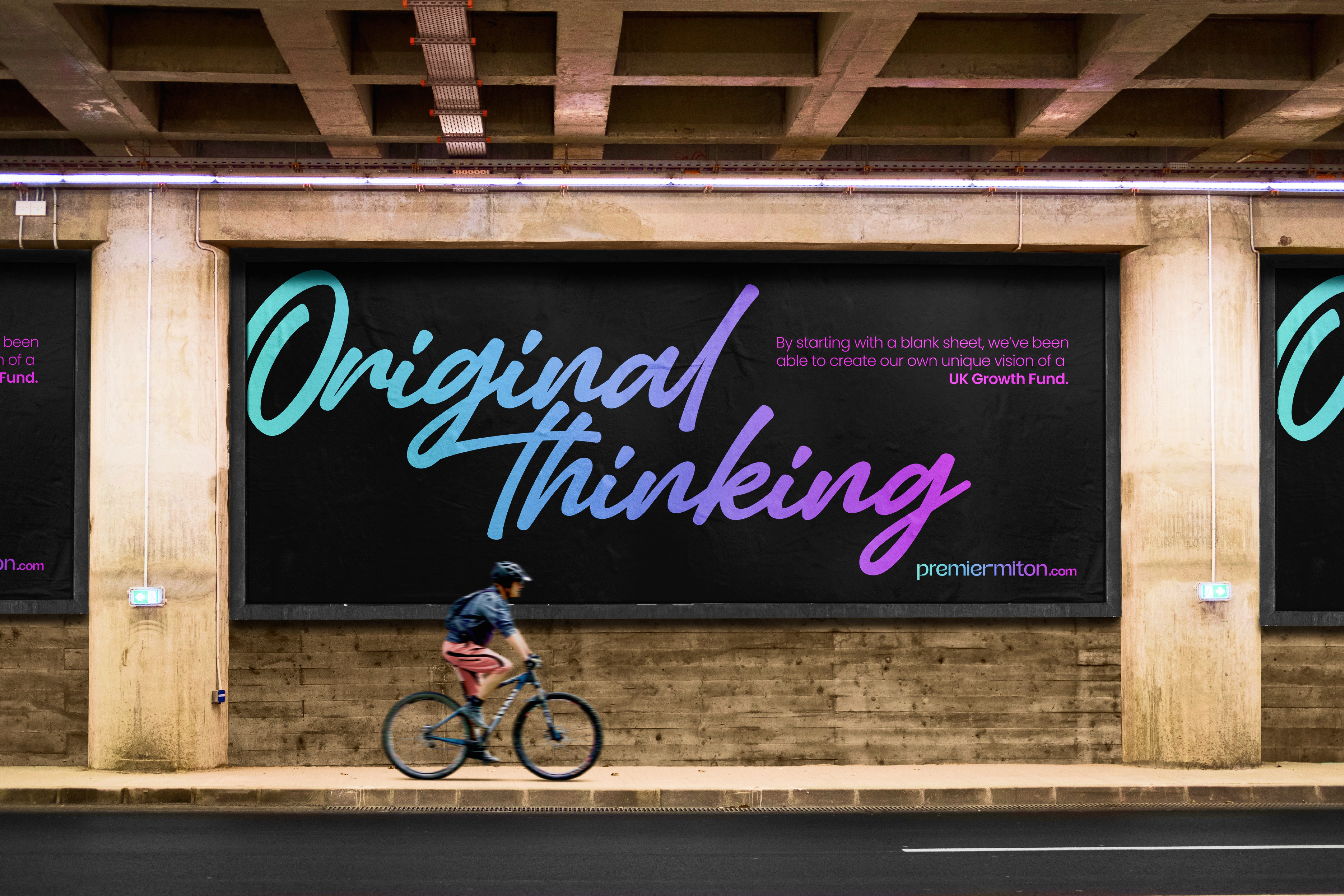 Large scale billboard showcasing the Premier Miton brand identity with large lettering.