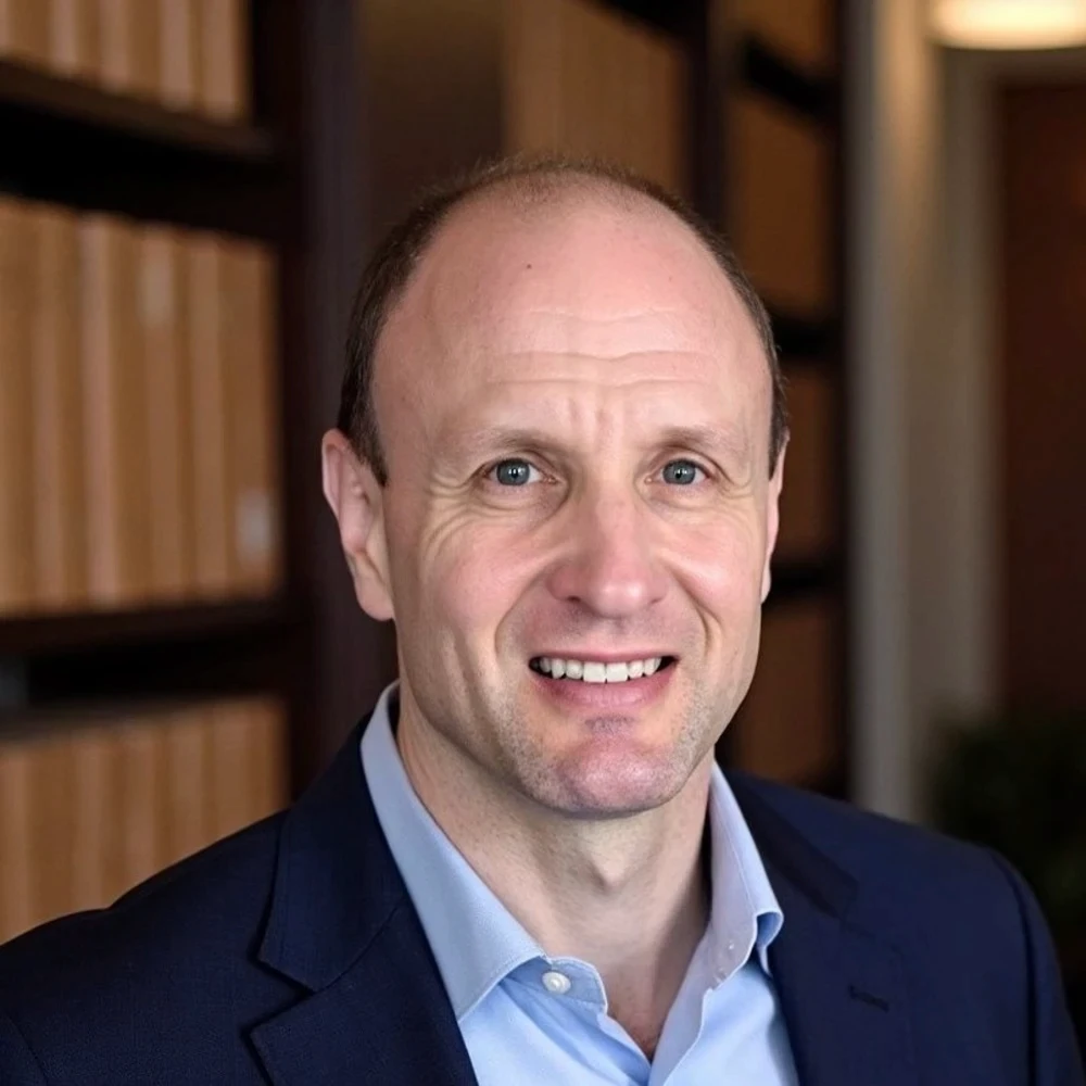 Man in suit smiling
