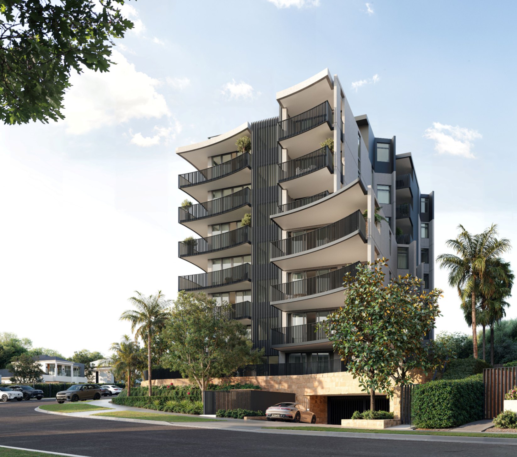 Modern apartment building exterior with curved balconies and landscaped surrounds in Miranda NSW