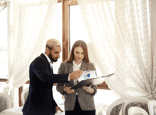 A man is looking his document on a wedding