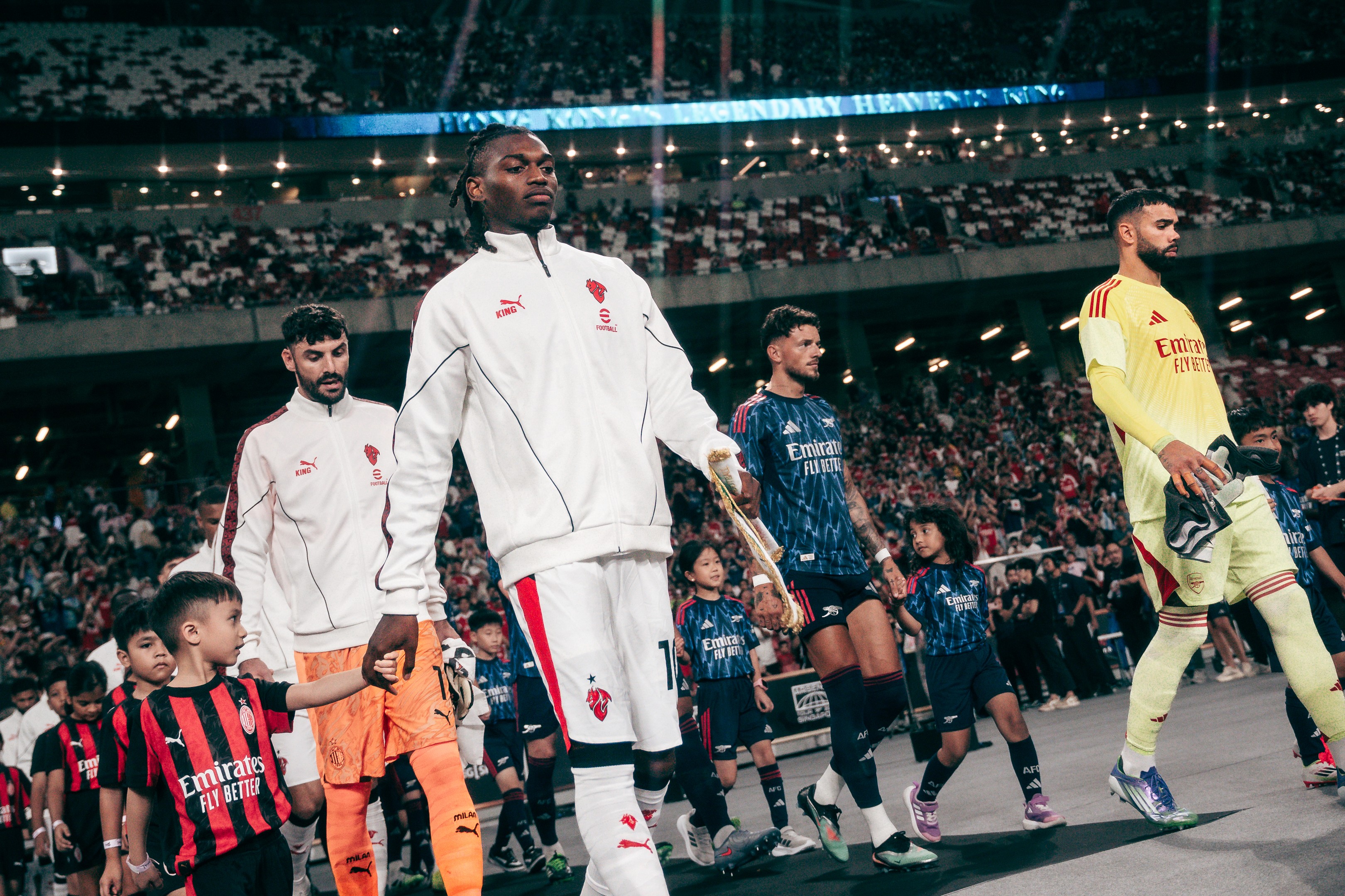 Rafael Leão walks out during a match between Arsenal and A.C. Milan at the National Stadium in Singapore for the Singapore Festival of Football 2025